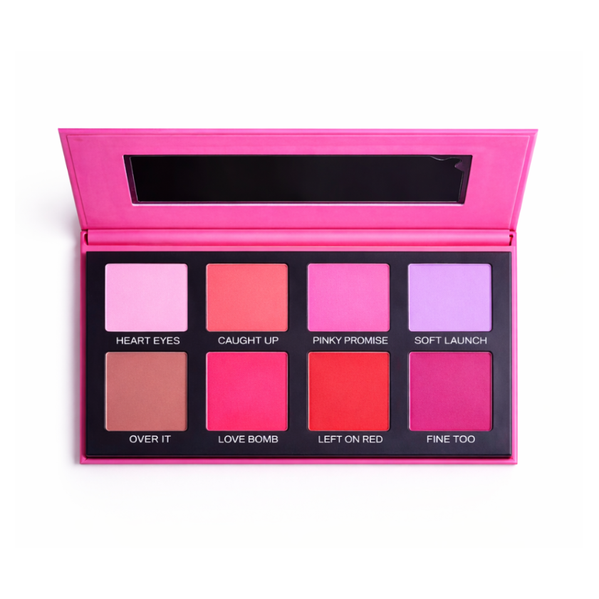 Blush makeup palette with various shades of pink and red tones on a white background